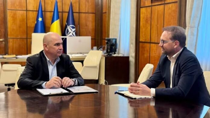 Ilie Bolojan și Dominic Fritz